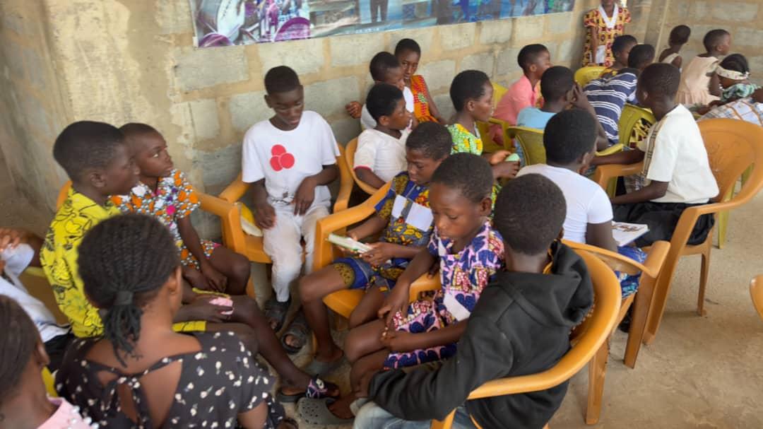 Children sharing a lesson in a small group
