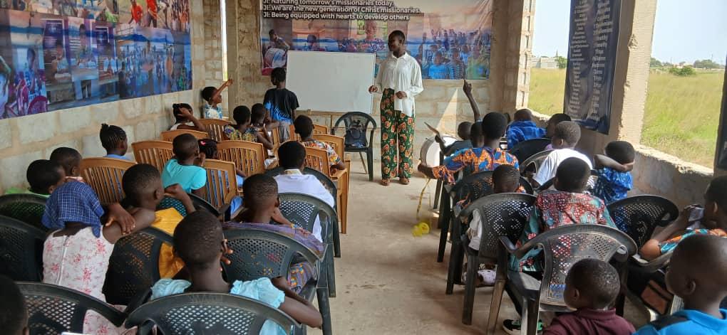 Children listening and responding during Bible teaching